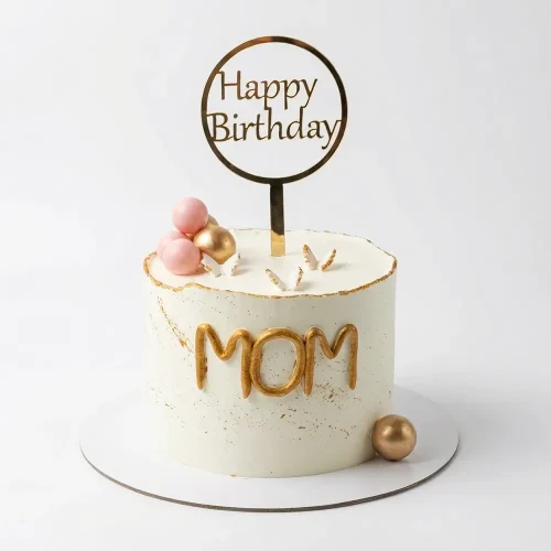 White & gold Mom birthday cake with Happy Birthday topper – custom birthday cake delivery Abu Dhabi